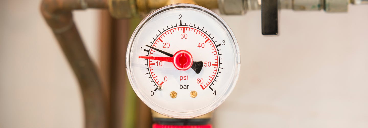 A close up of a central heating pressure gauge in a UK home