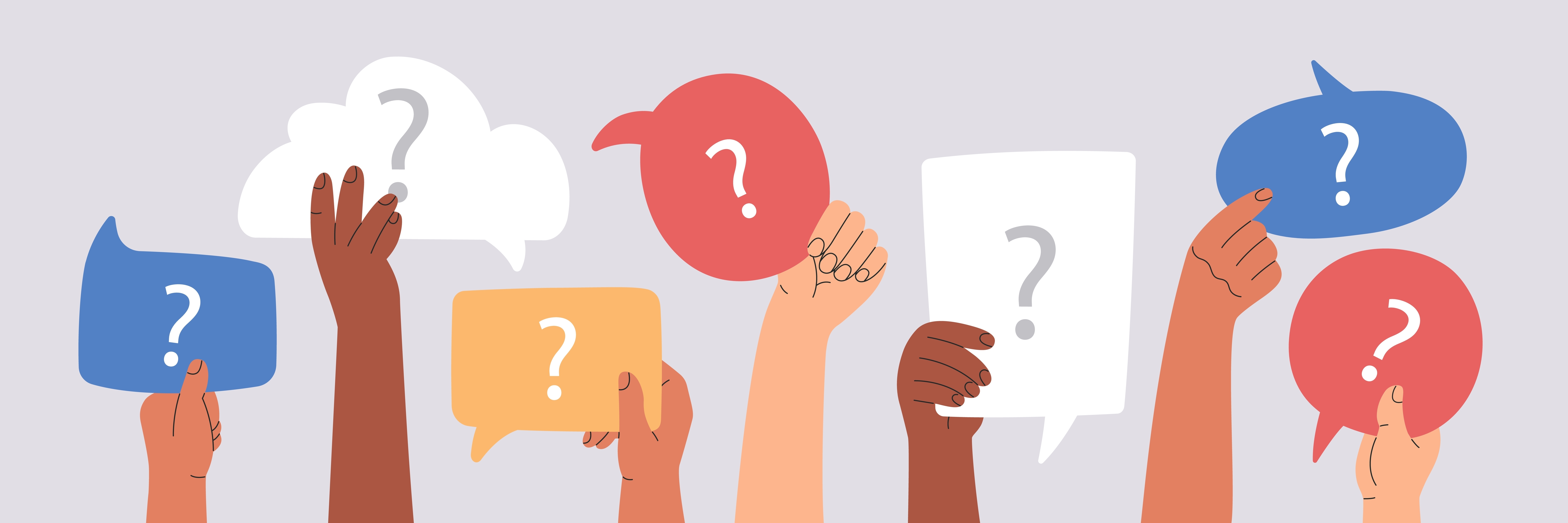 Hands holding question mark signs