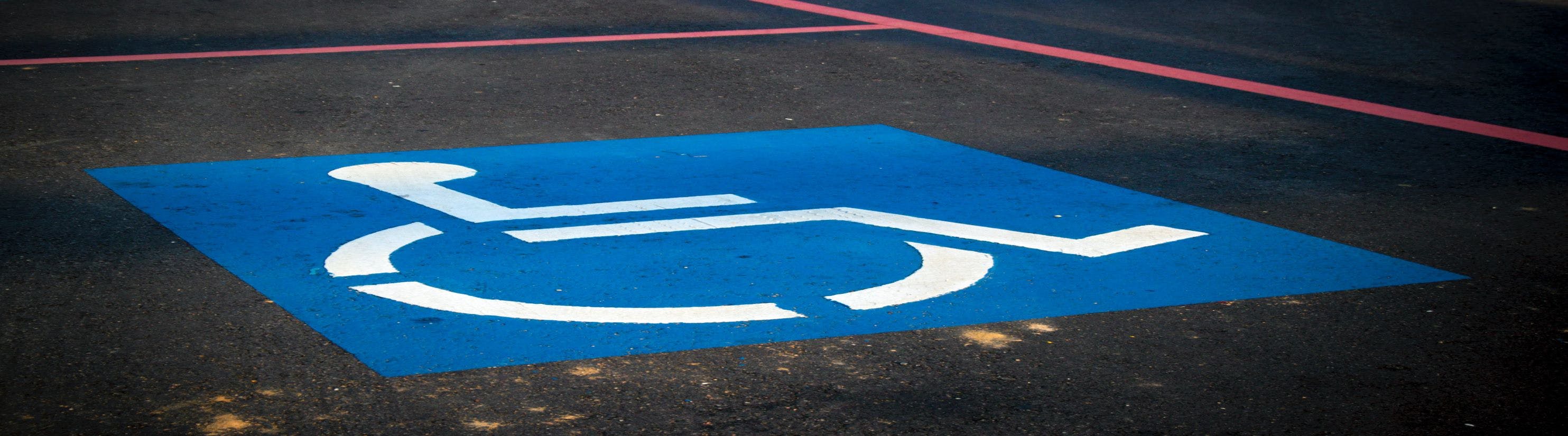 Photo of Disabled Persons Parking Place road markings.