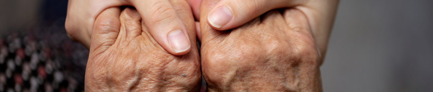 Two people holding hands