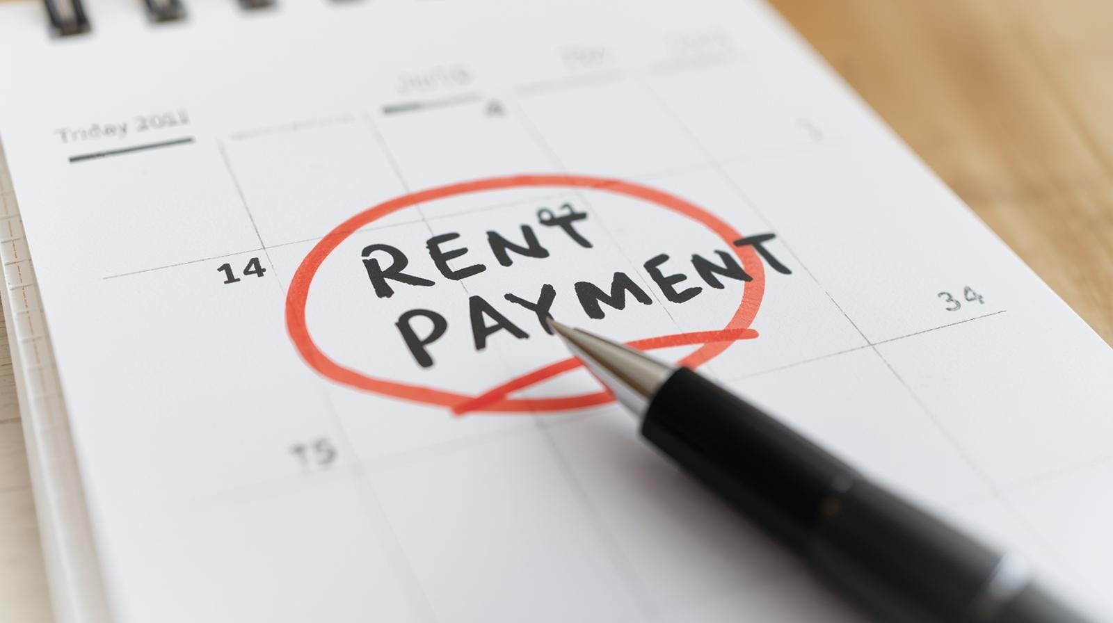 A calendar showing a date circled with the words rent payment
