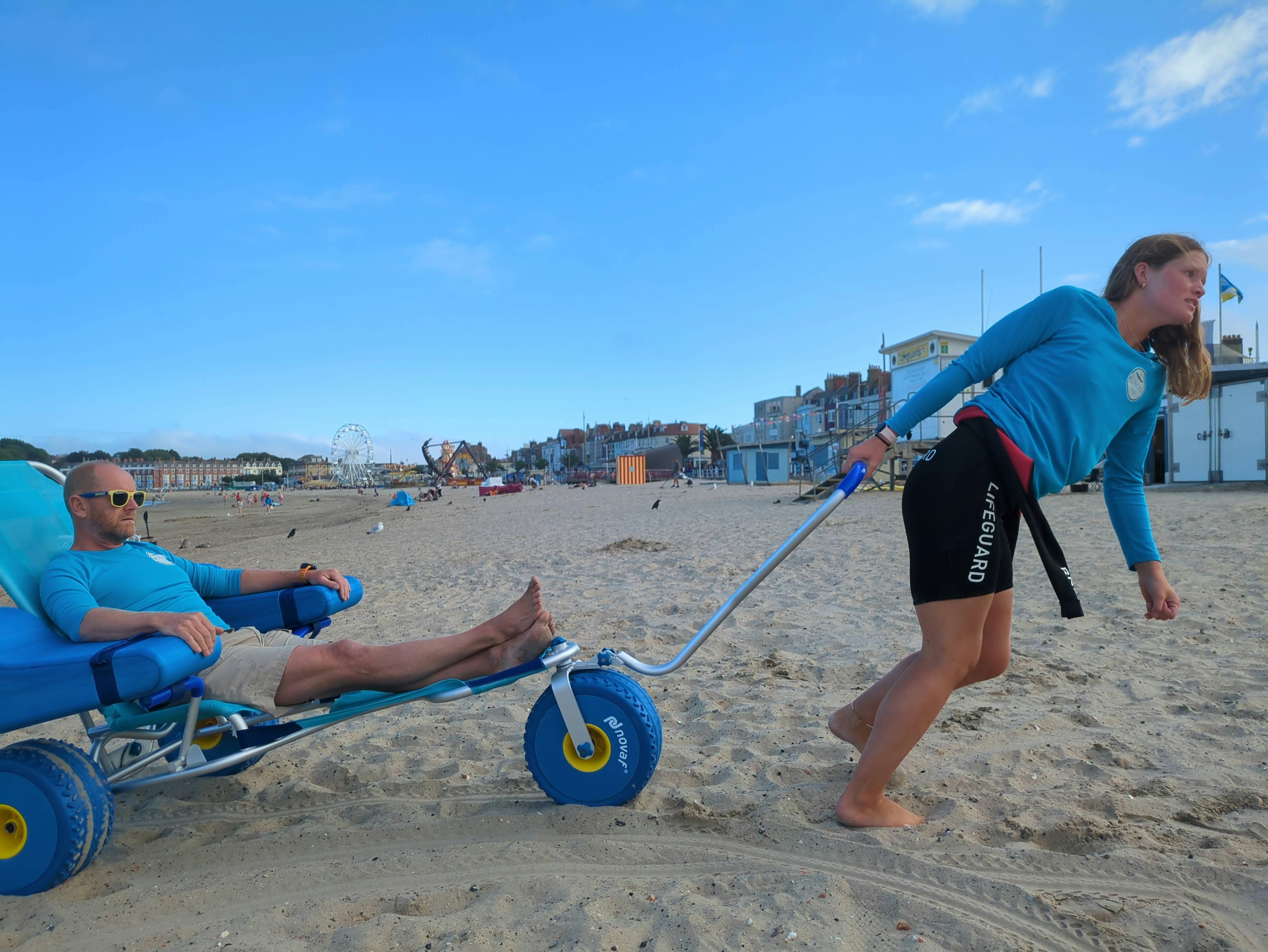 Weymouth Surf Live Saving Club testing amphibious chair on Weymouth Beach (Credit Weymouth SLSC)