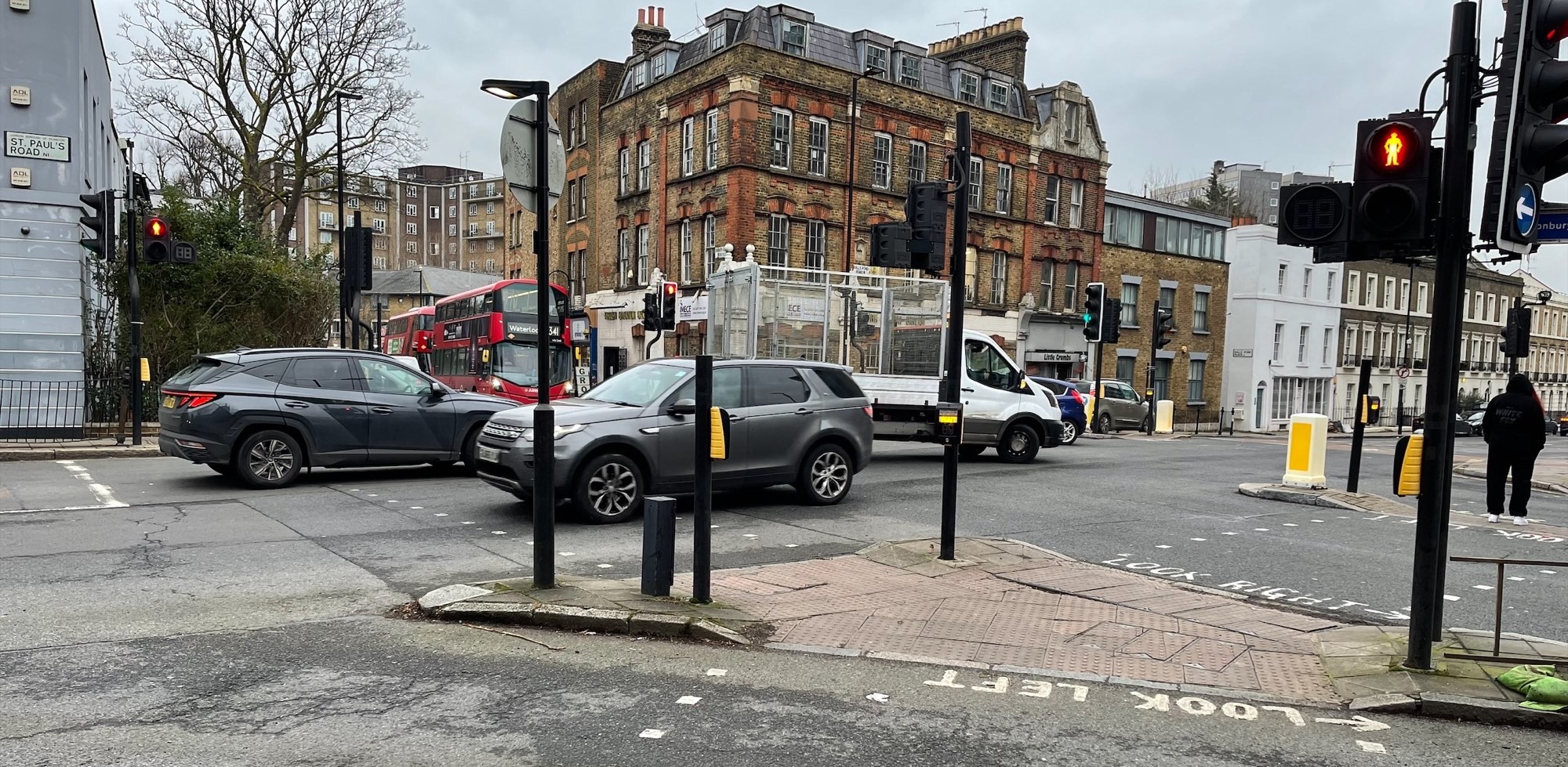 St Paul's Road and Essex Road junction with people walking and motor vehicles