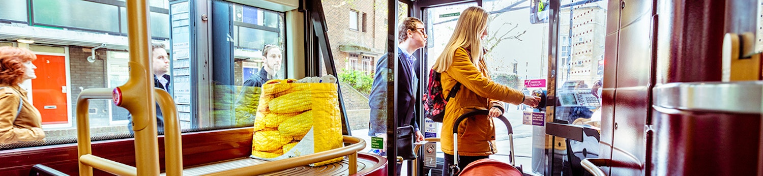 People getting on a bus