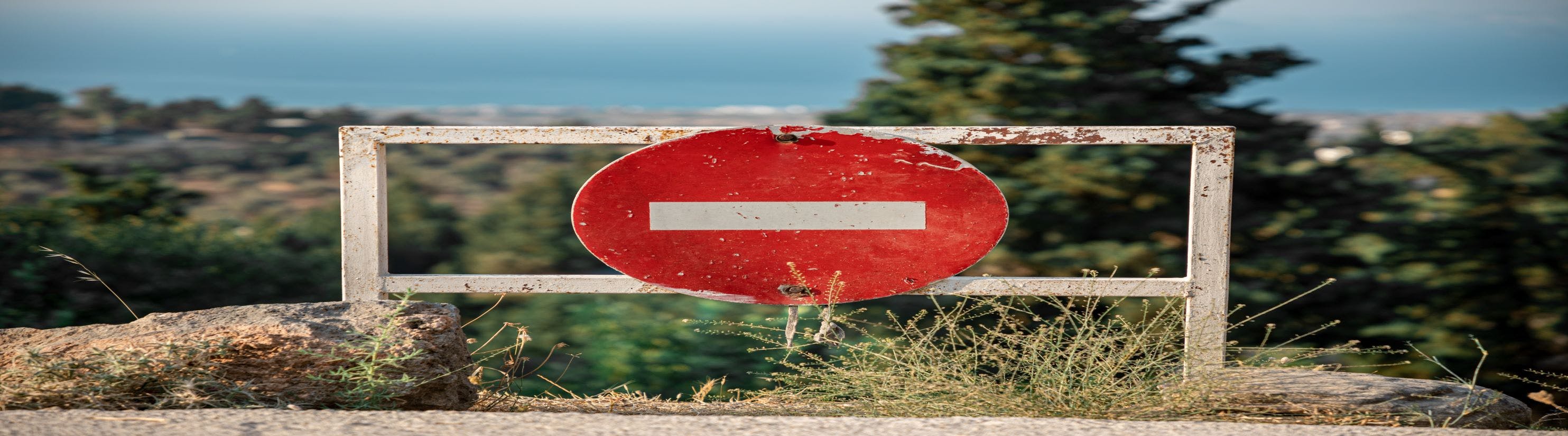 Photo of 'No Entry' sign on gate.