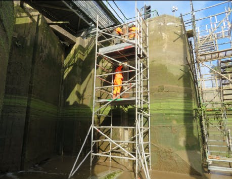 Contractors working on the downstream stop log liners of Grand Sluice, October 2025.