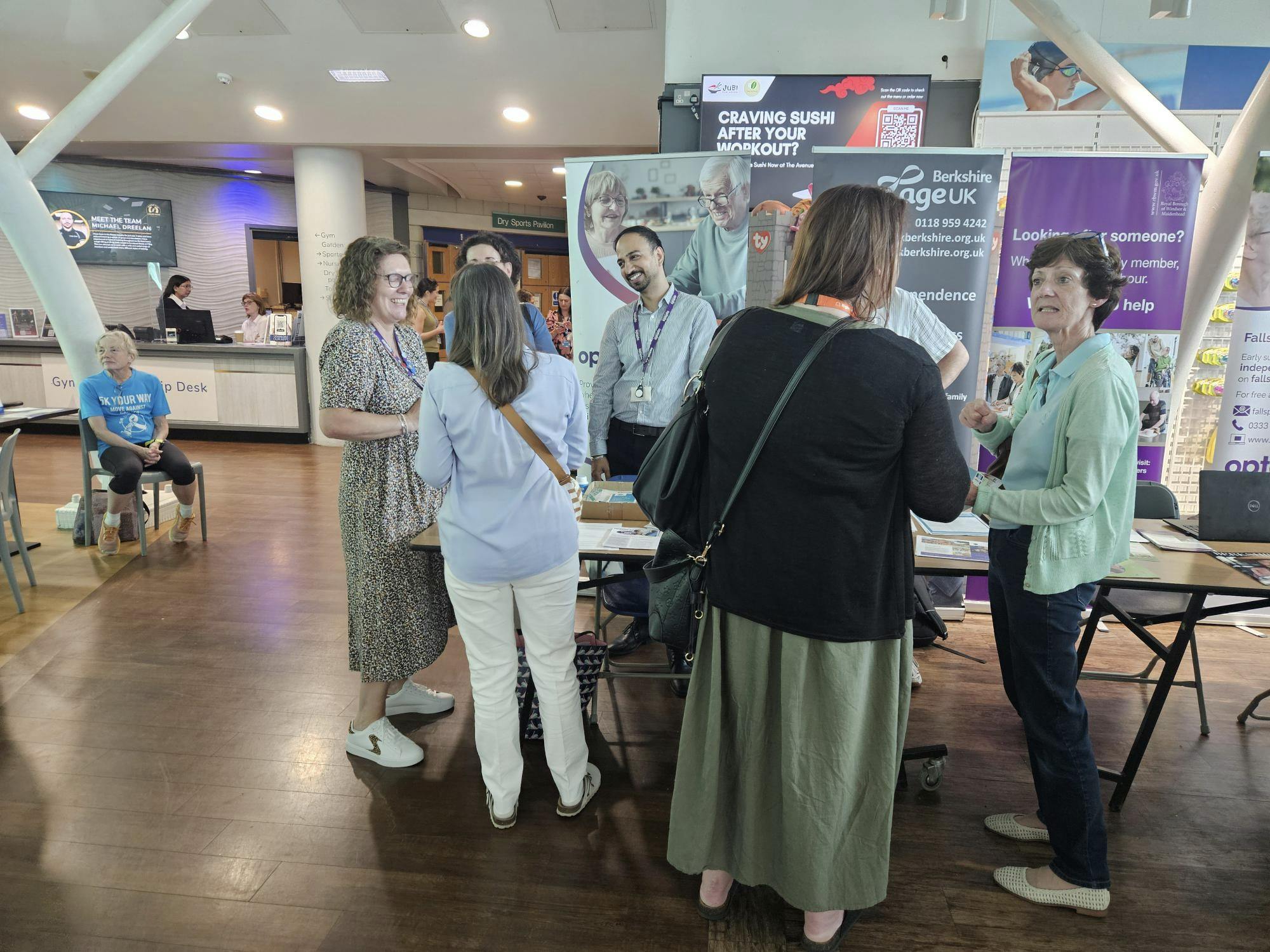 Residents and staff talking about available services
