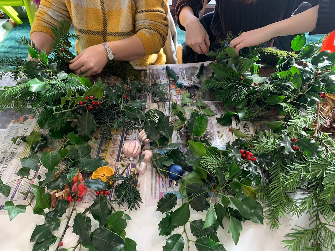 close up of wreath making