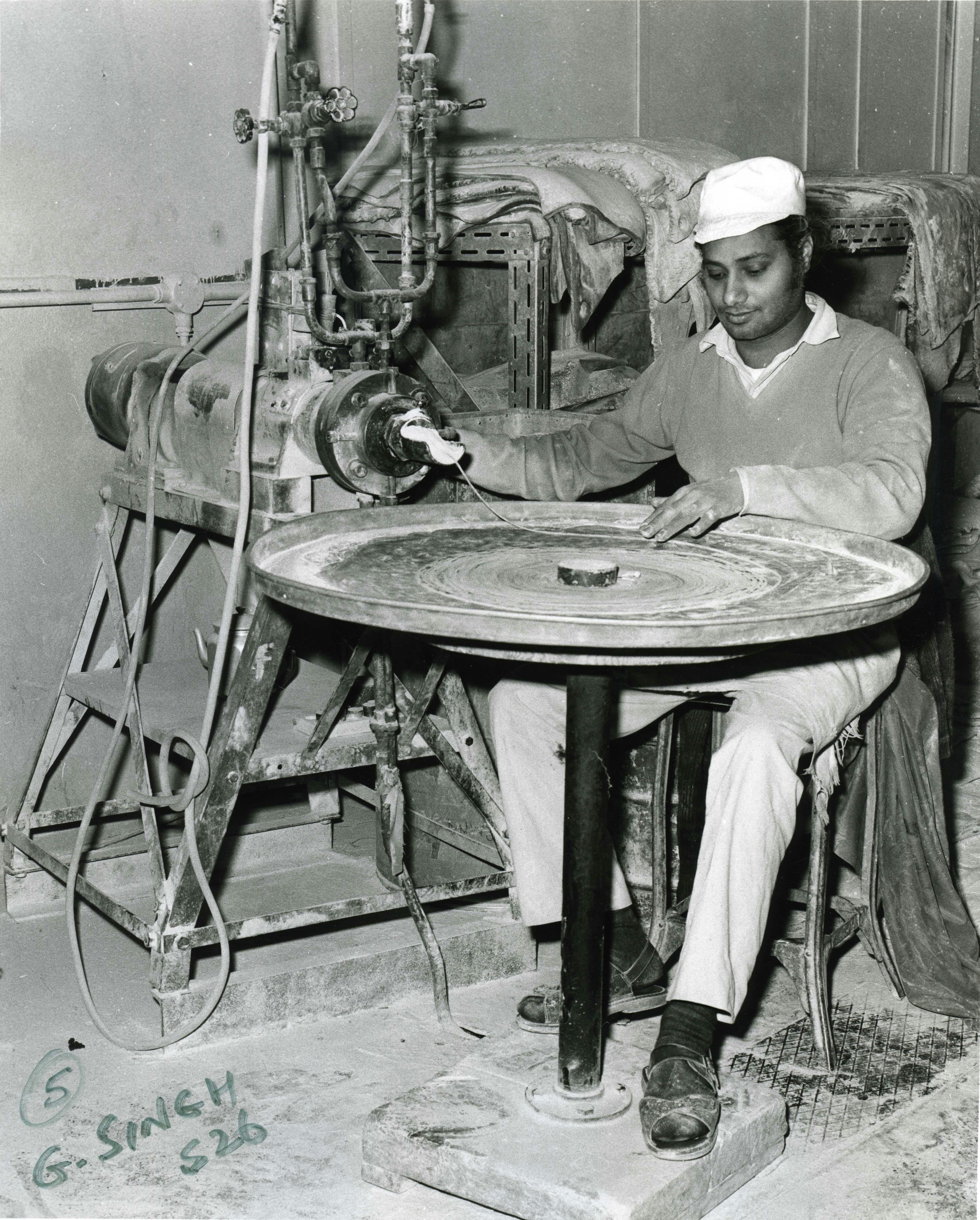 Worker at William Warne's Rubber Works c1960s from the William Warne Collection in the LBBD Archive