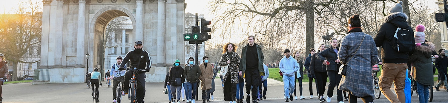 Image of people walking and cycling at a crossing