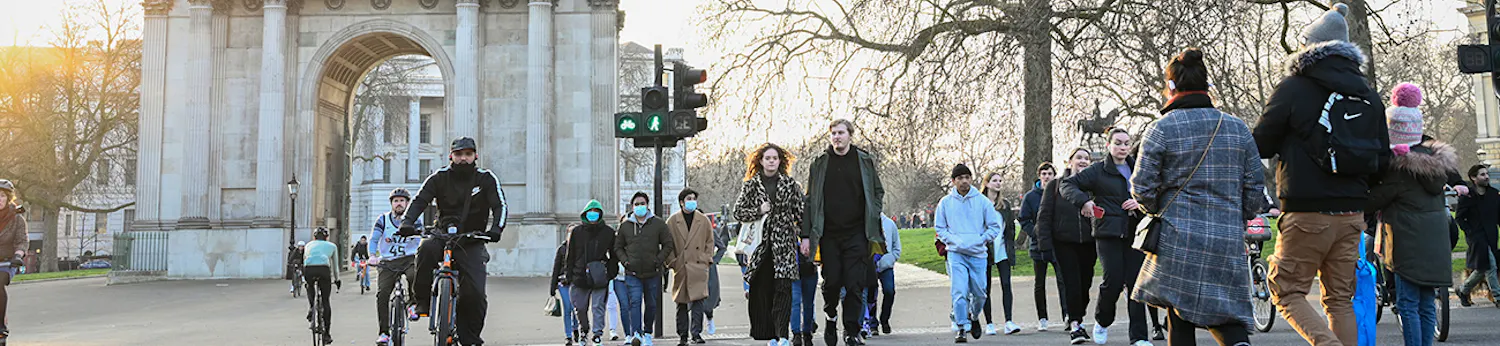 Image of people walking and cycling at a crossing