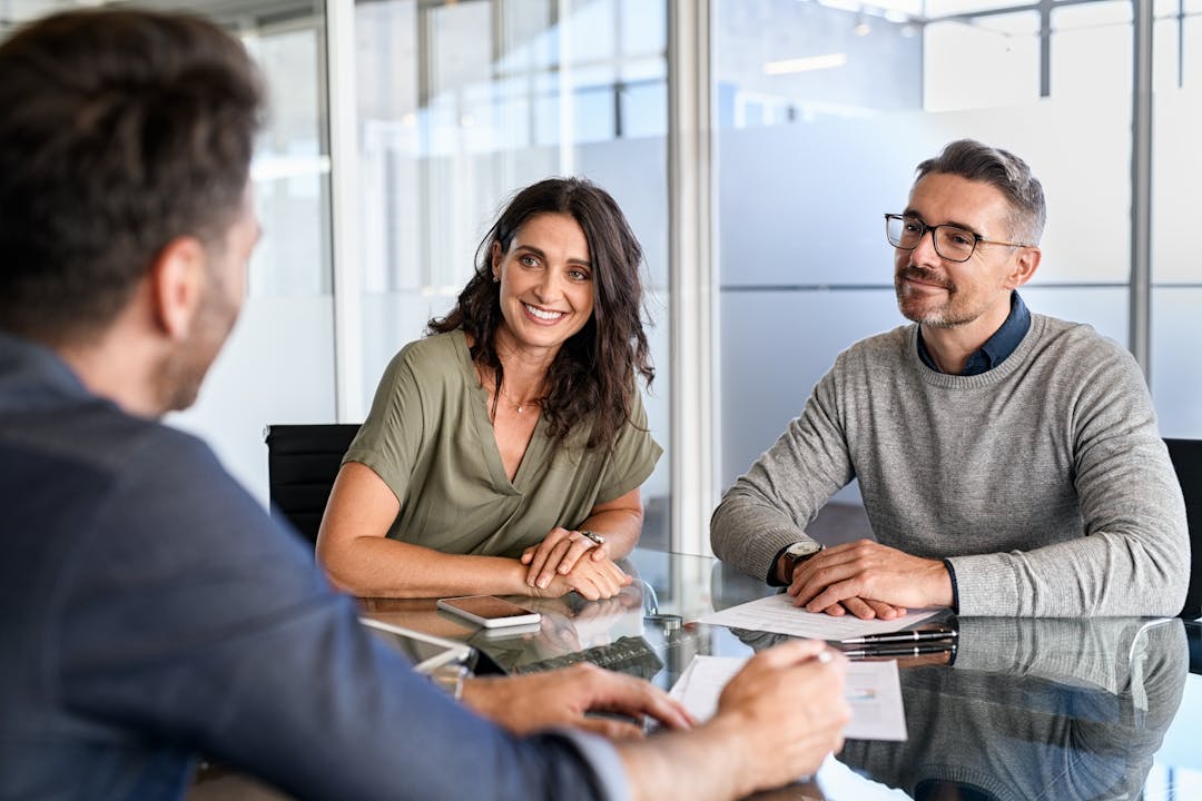 Smiling couple at appointment