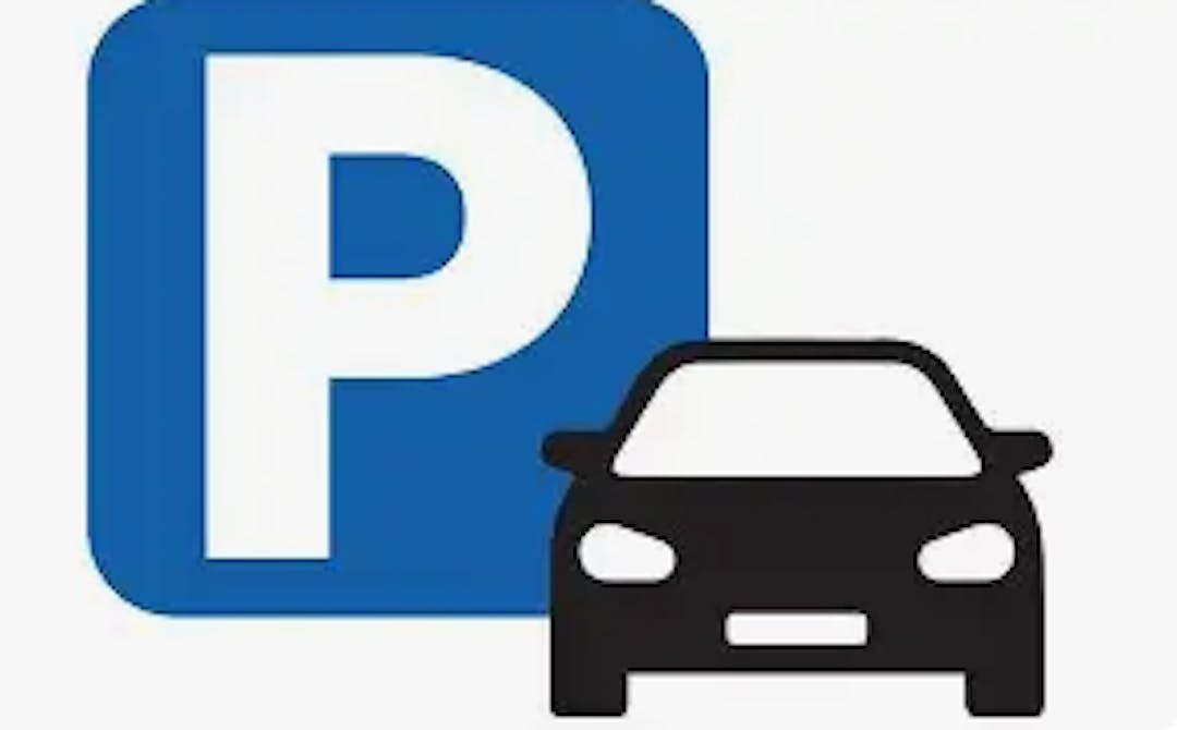 A white P on a blue background with a drawn car in front