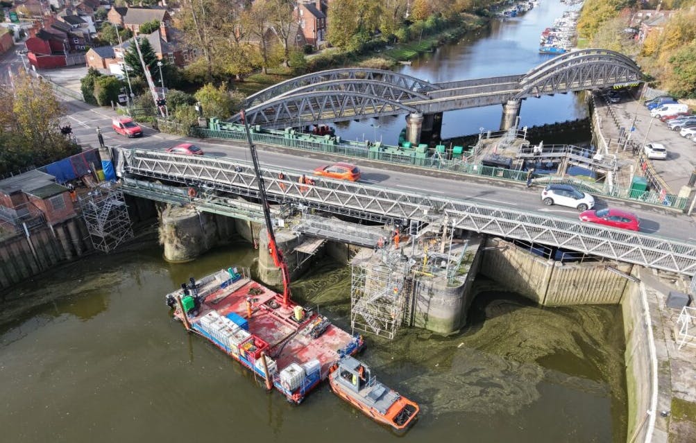 Lifting a new access footbridge in place over channel 3 of Grand Sluice, November 2025.
