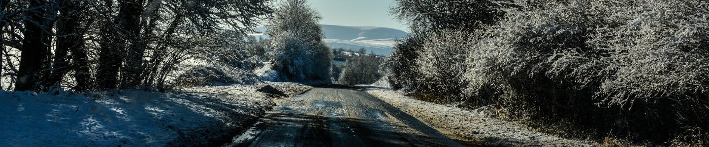 An icy south Powys road in the sunshine