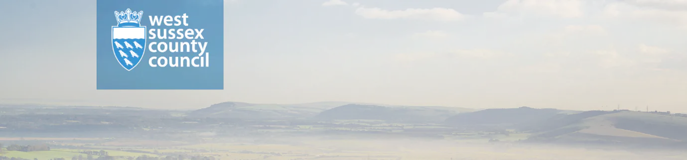 West Sussex County Council logo over an ariel view of West Sussex