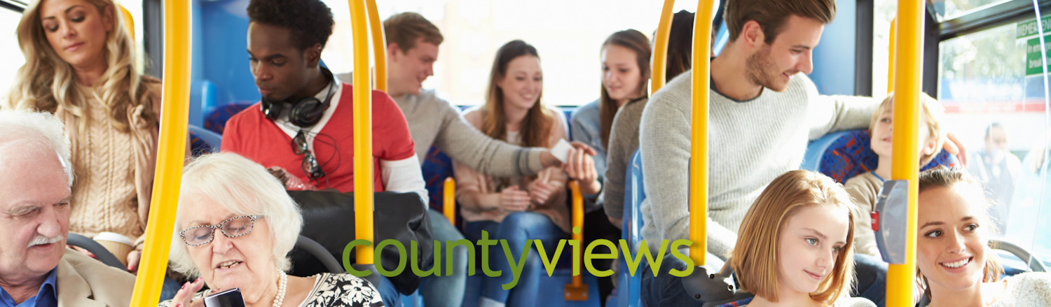 image of people sitting on a bus