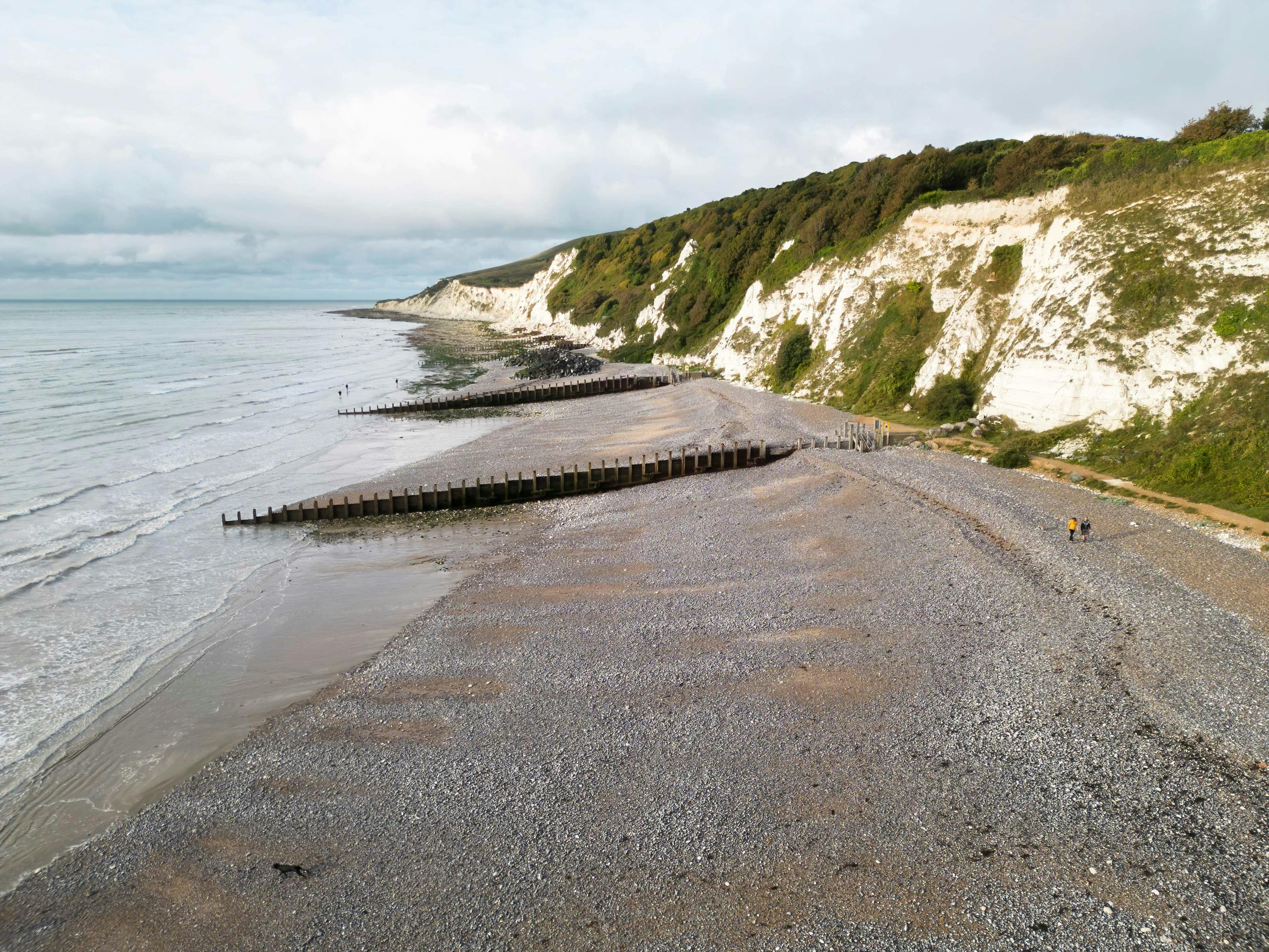 The chalk cliffs and beach at Holywell, the most western point of the scheme area