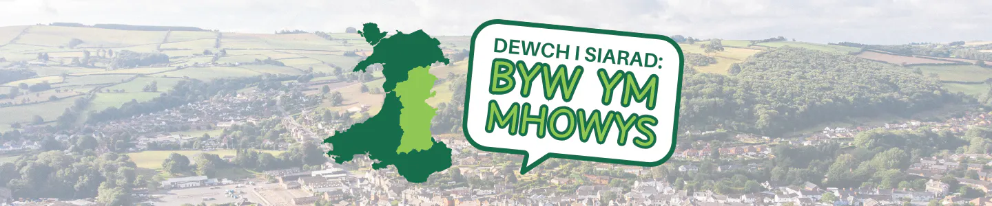 Let's Talk Living in Powys written in green on a background of a view of South Powys