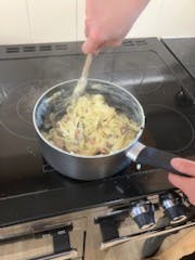 Crispy bacon and sausage carbonara