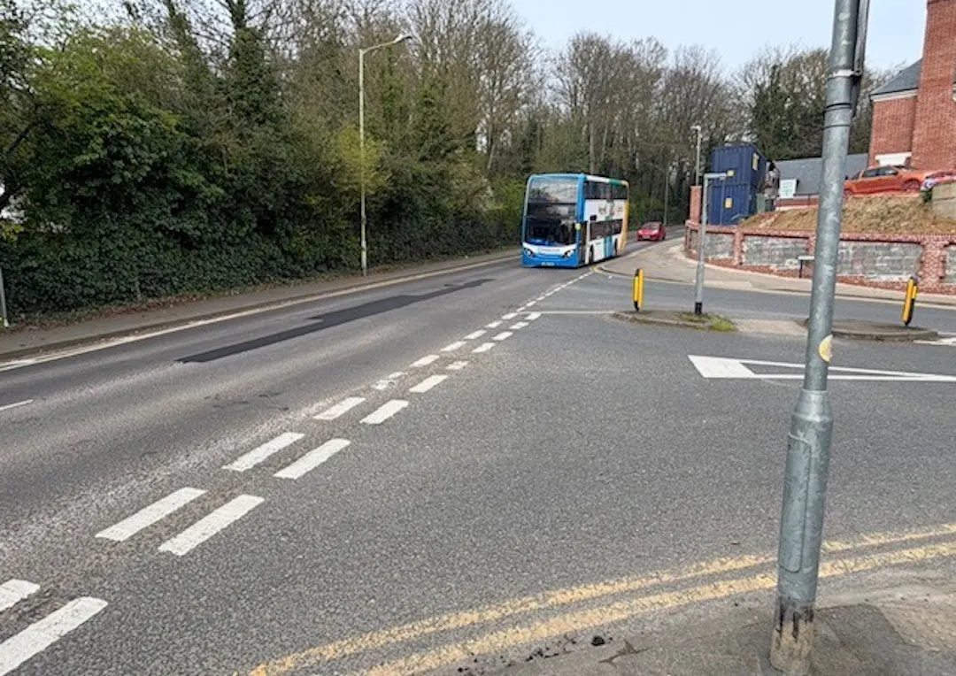 Photo showing the St Stephen's Hill and Downs Road junction with a bus travelling along St Stephen's Hill. 