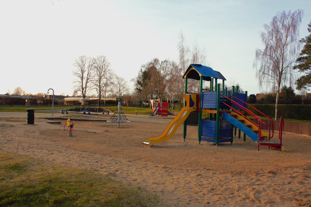 Waterloo Park play area with the current climbing slide, rocker  and sandpit.