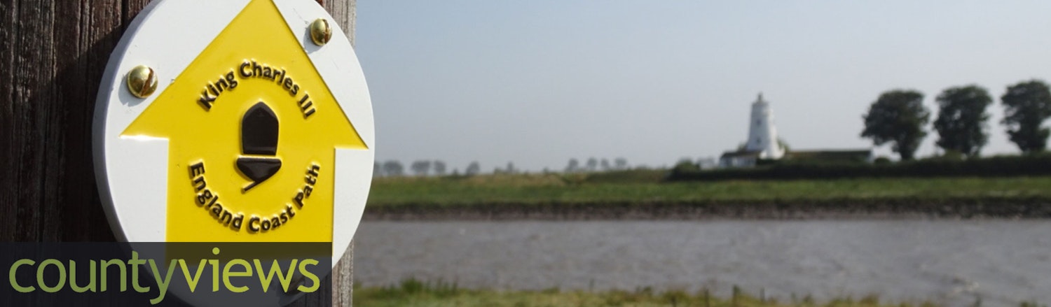 Image of the coastal path wooden post.