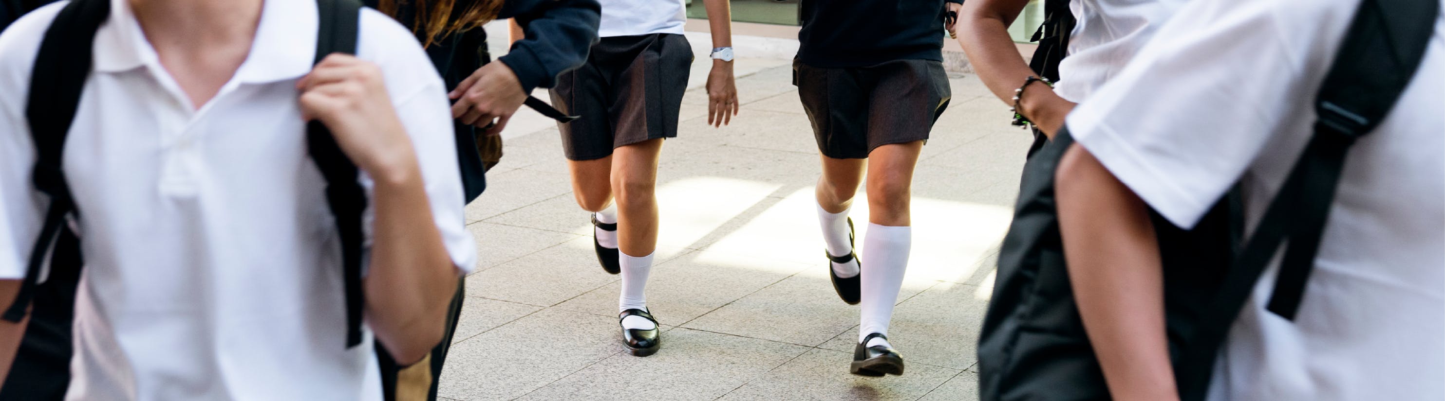 Photo of school children walking.