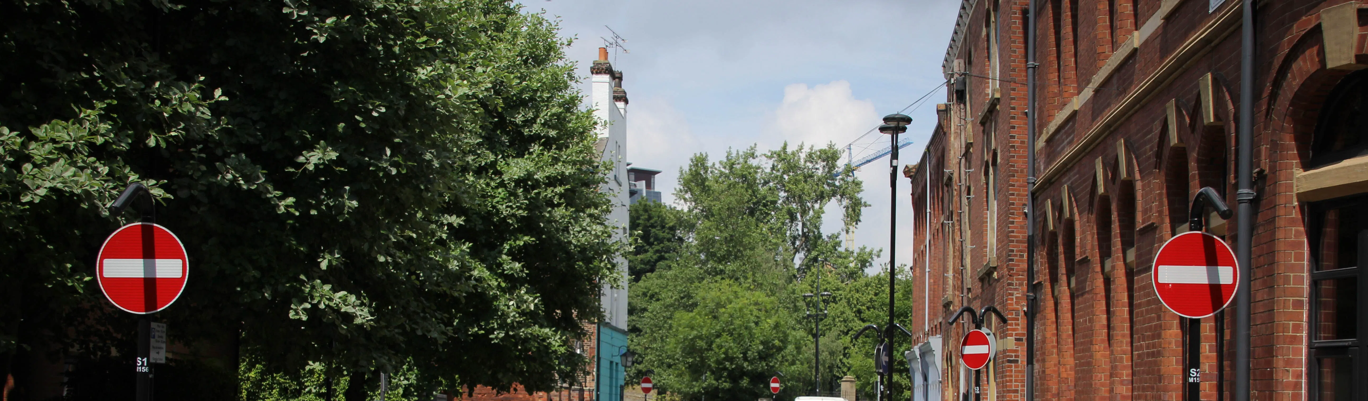 Photo of No Entry signs on lamp columns.