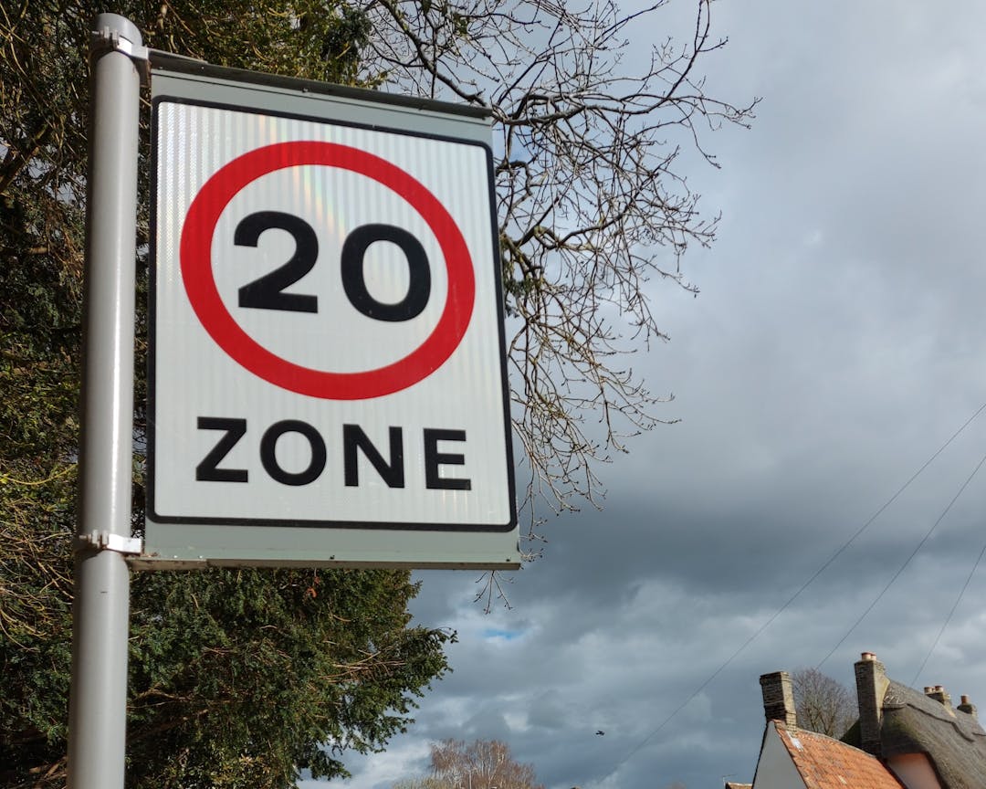 A 20 mile per hour zone sign in Grantchester village, Cambridgeshire