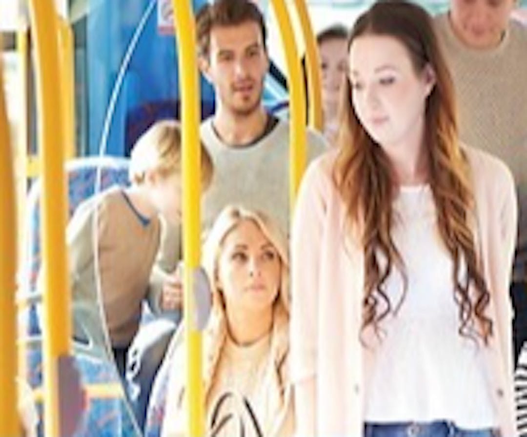 young people on a bus