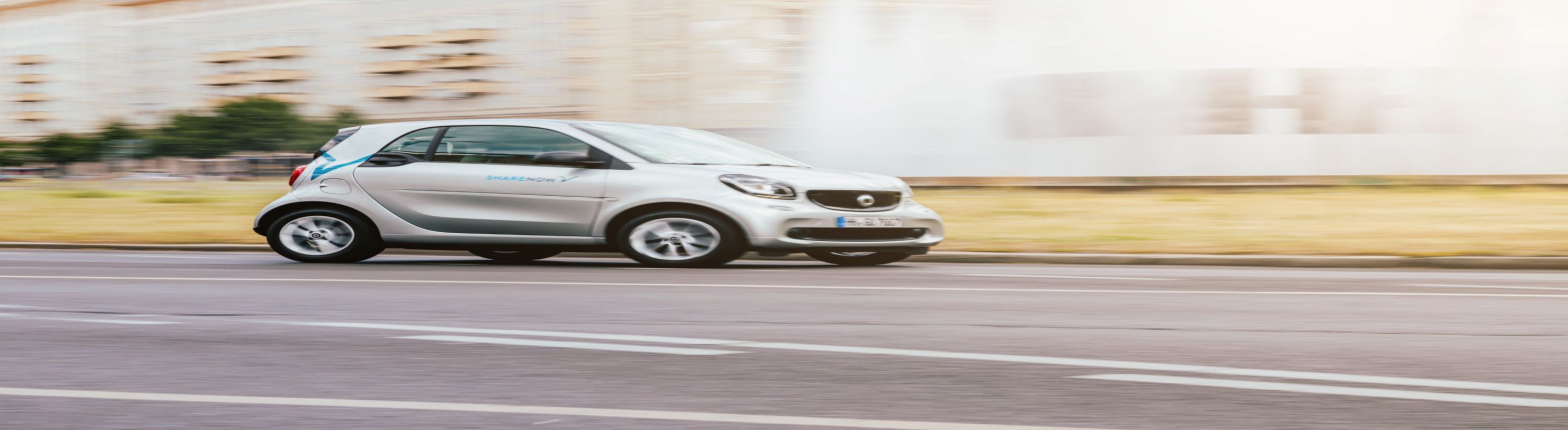 Photo of electric vehicle sign painted on road.