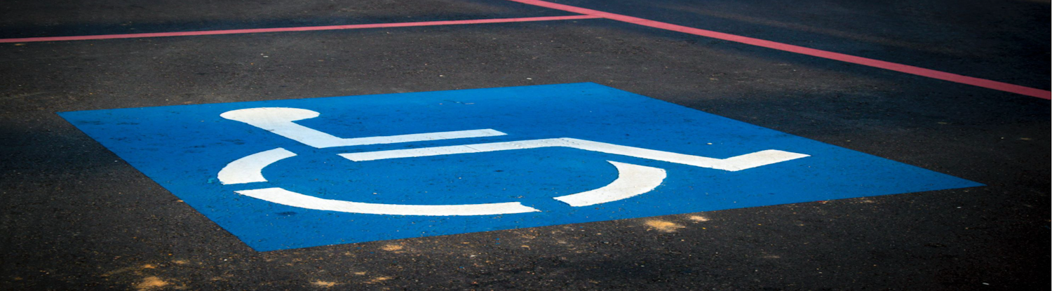 Photo of Disabled Persons Parking Place road markings.