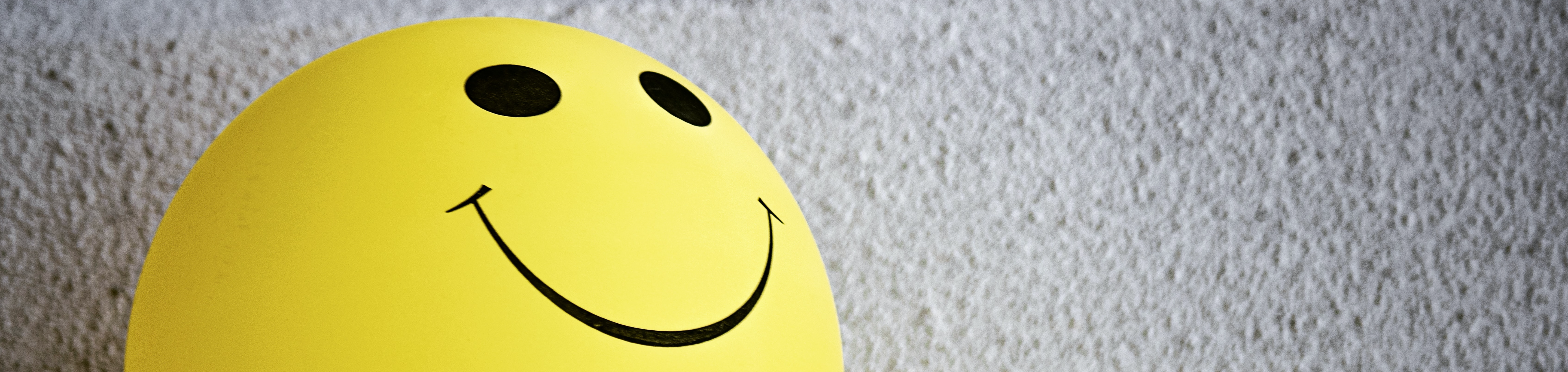 Smiley yellow balloon