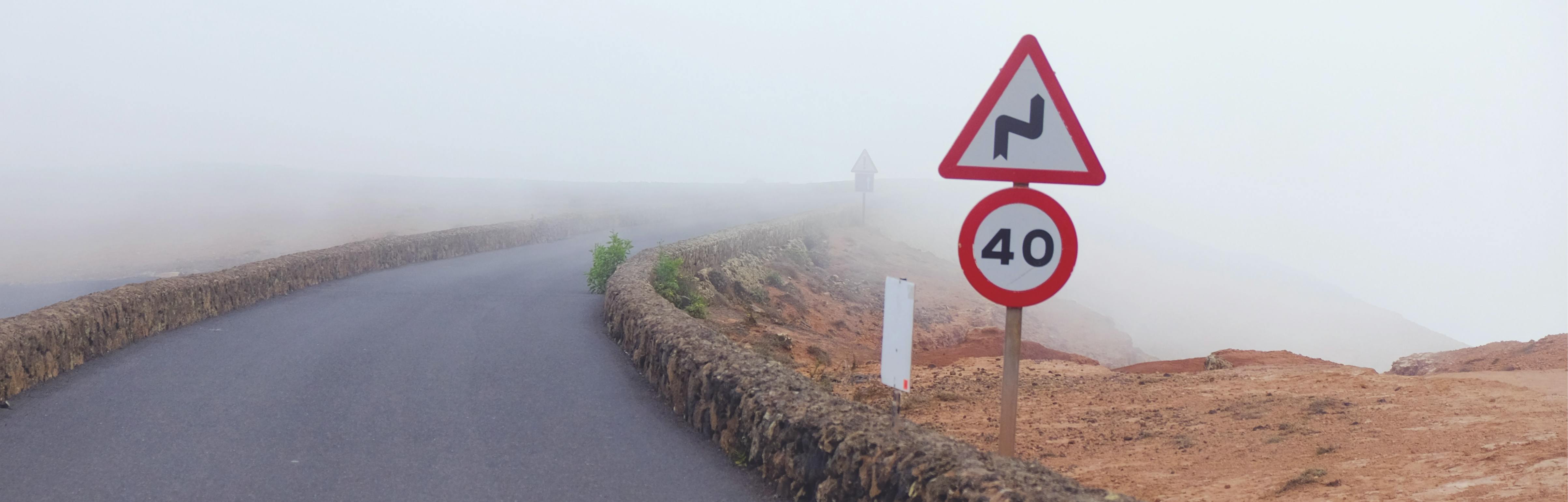 Photo of 40mph & bends in road sign.