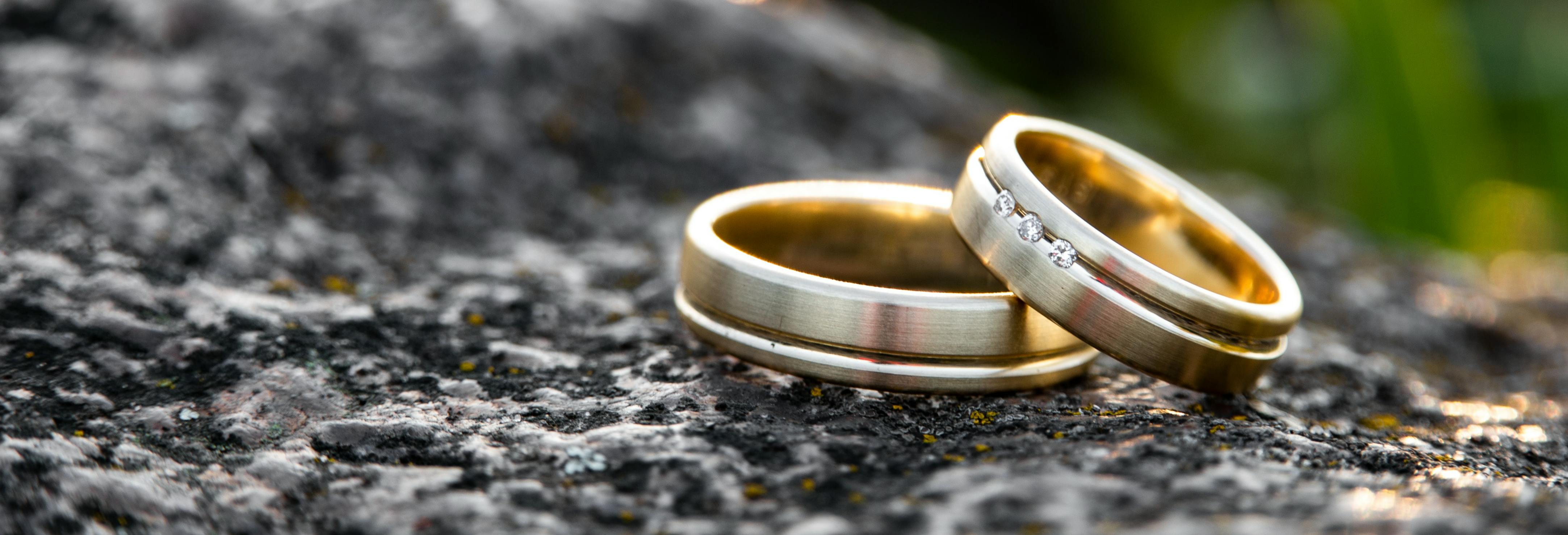 Wedding rings on a stone