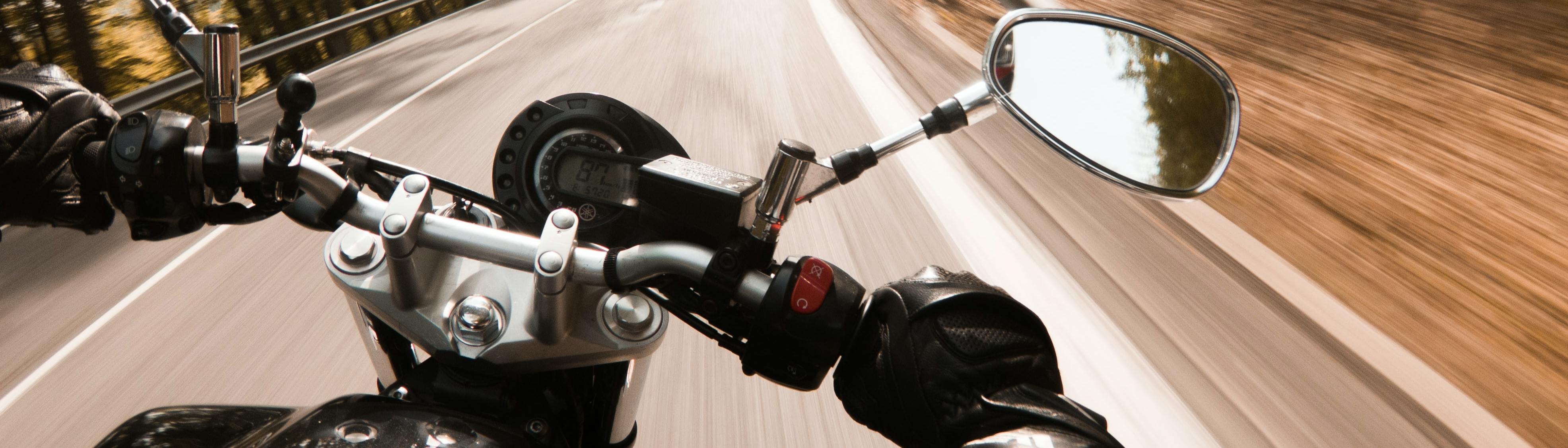 Motorcyclist driving on a road