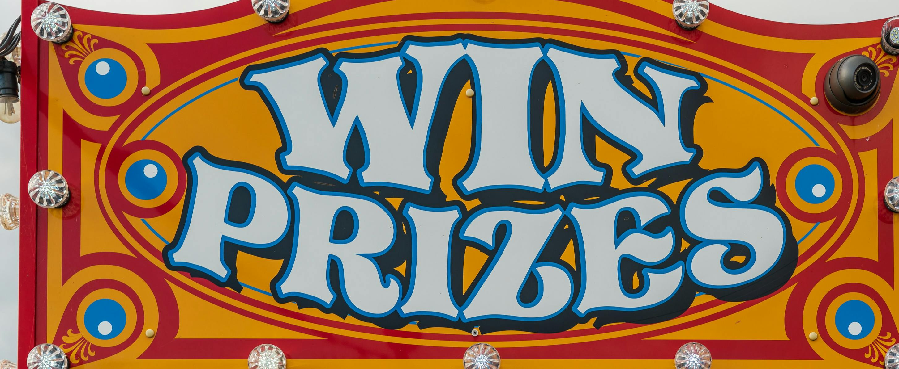Sign that says win prizes from a circus 