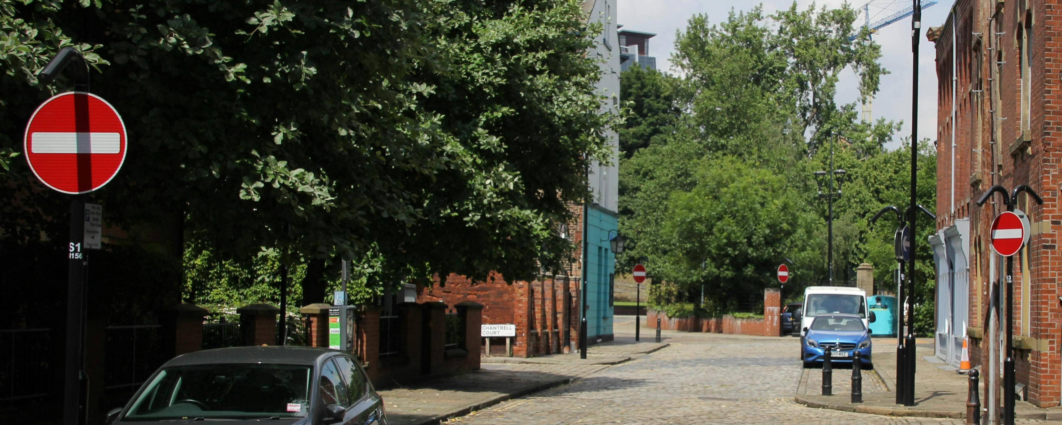 Photo of no entry sign on gate.