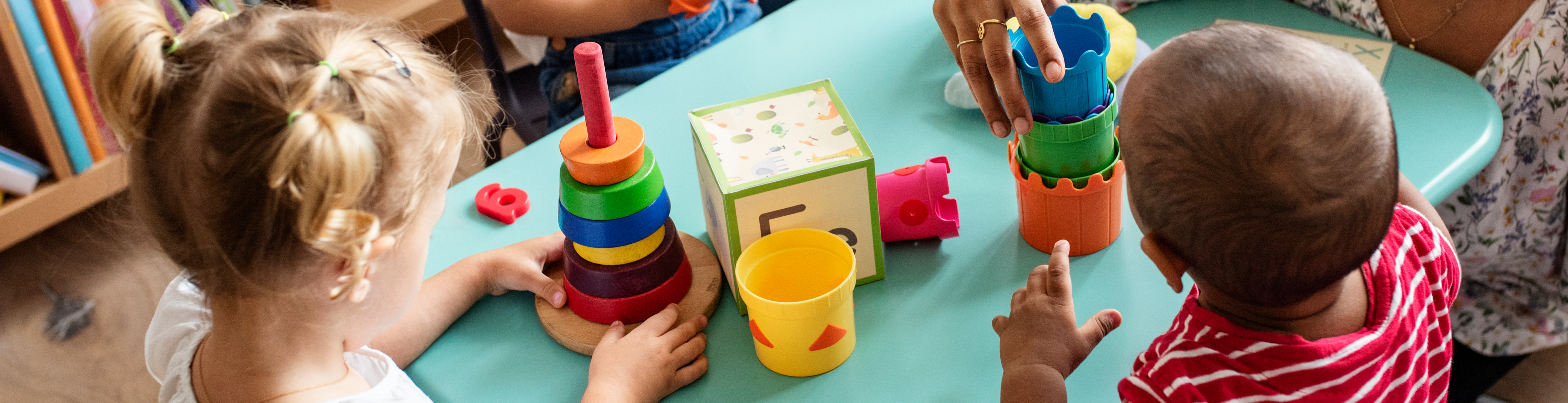 Children playing at activity table
