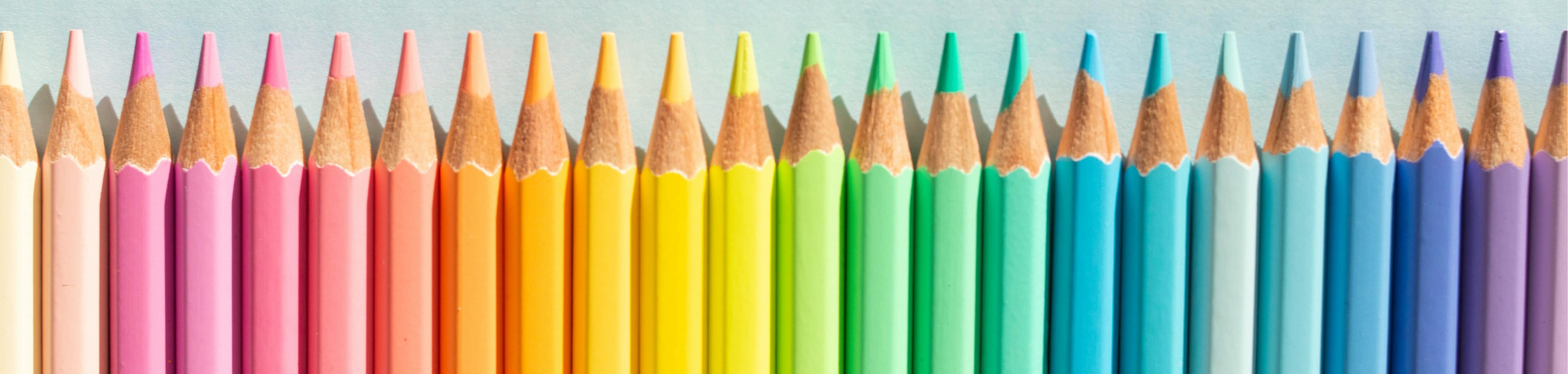 Multicoloured pencils in a row