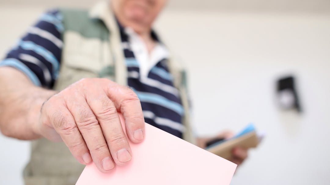 image of a man voting