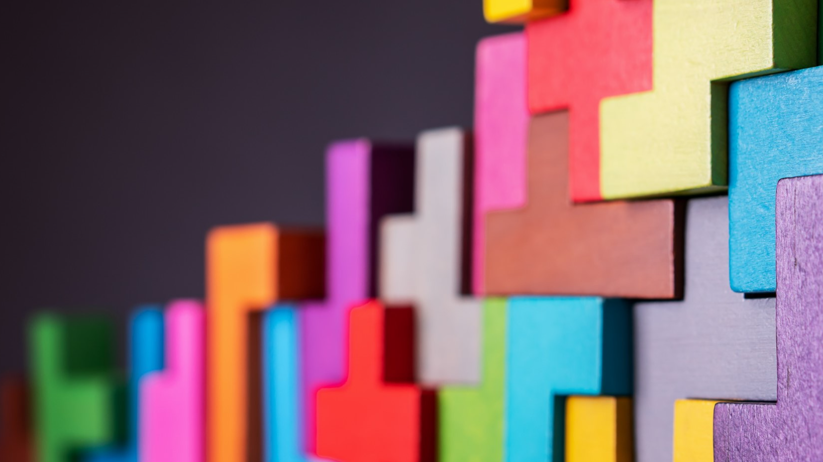 The picture is a multicolour image of building blocks