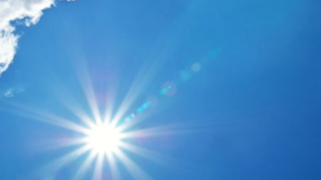 The sun in a blue sky