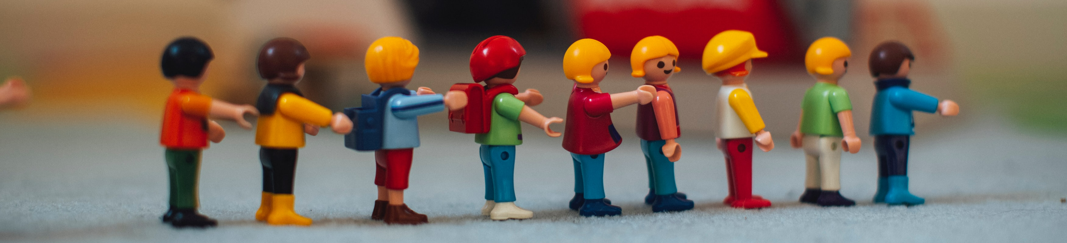 Lego figures stood in a queue