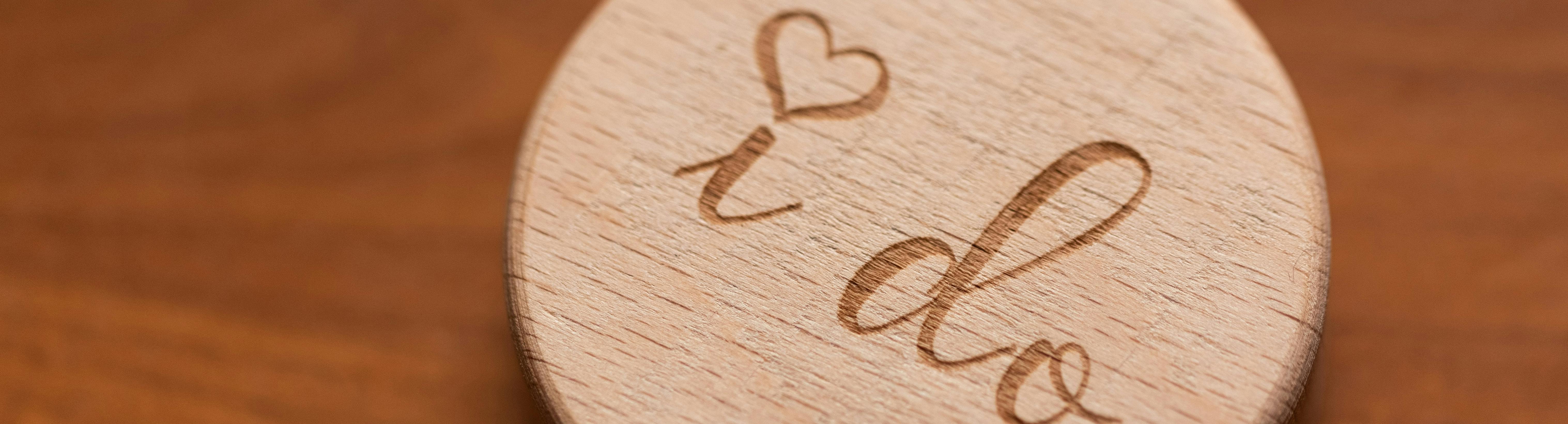 Wooden disk engraved with 'I do'