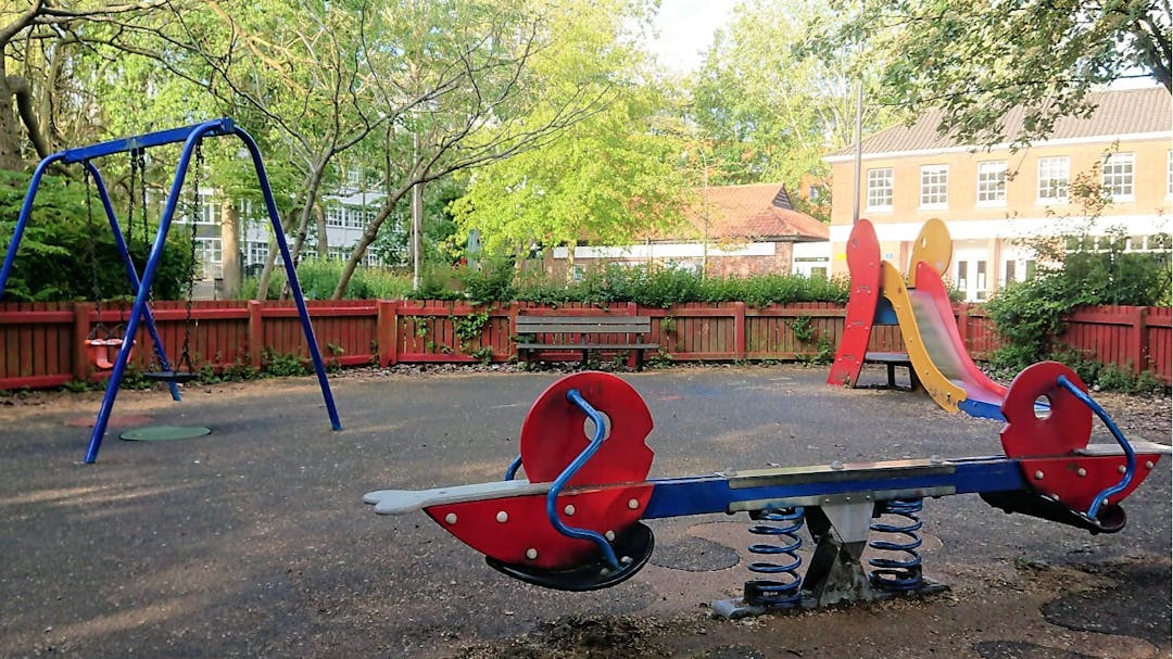 St Georges play area with the current swing set, benches, slide and see-saw.
