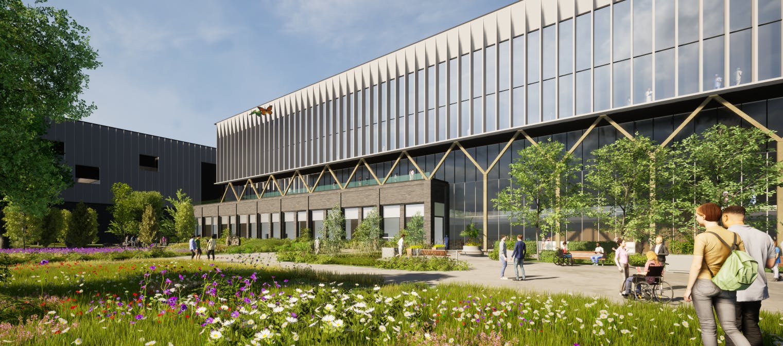 An artists impression of how the new Hospital could look  - a modern building with large windows and green space
