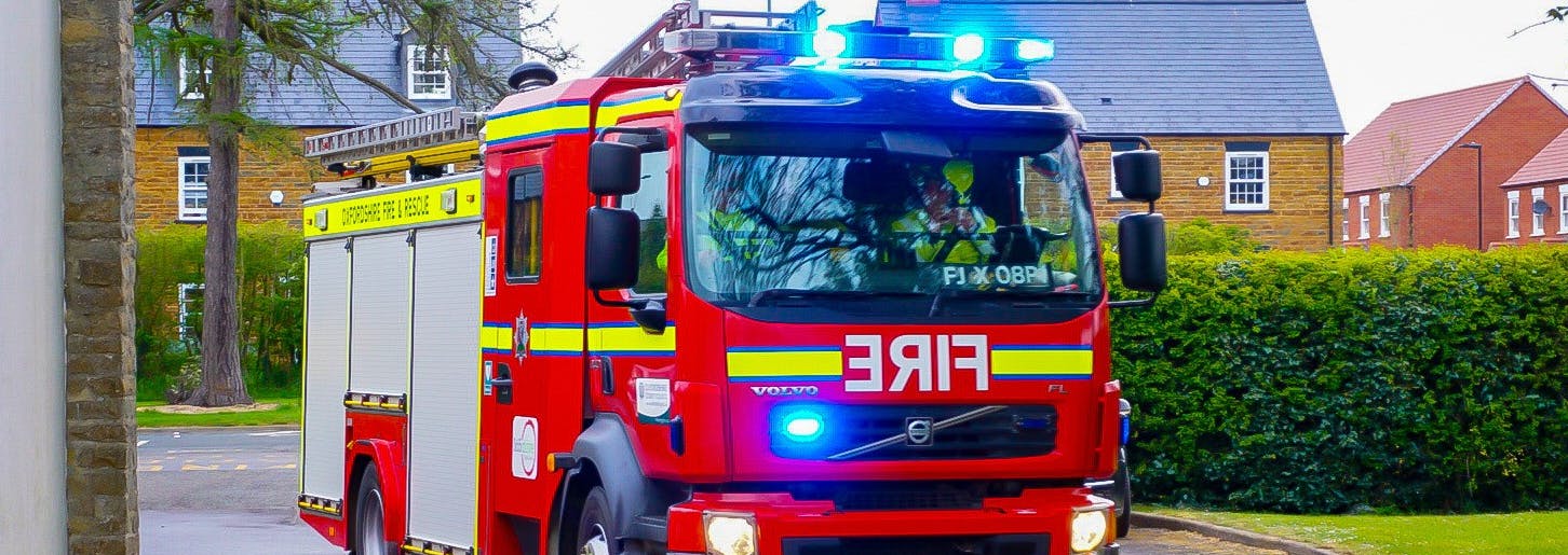Fire engine with blue lights flashing