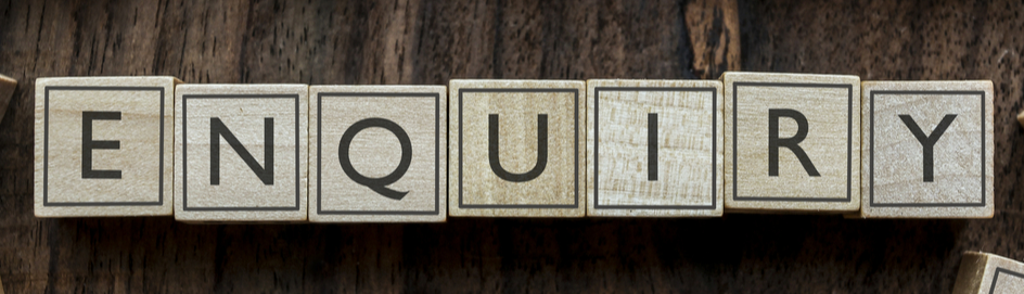 Enquiry written in letters on wooden blocks